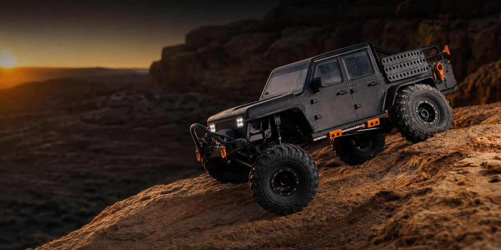 RC rock crawler fitted with custom accessories climbing sandstone at sunset