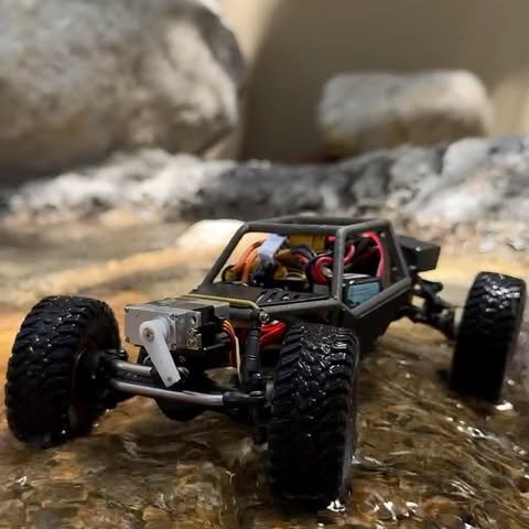 RC crawler testing a rocky obstacle